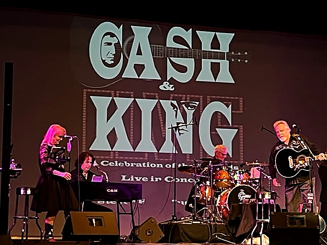 Cash and Elvis on the backdrop, Steven on stage